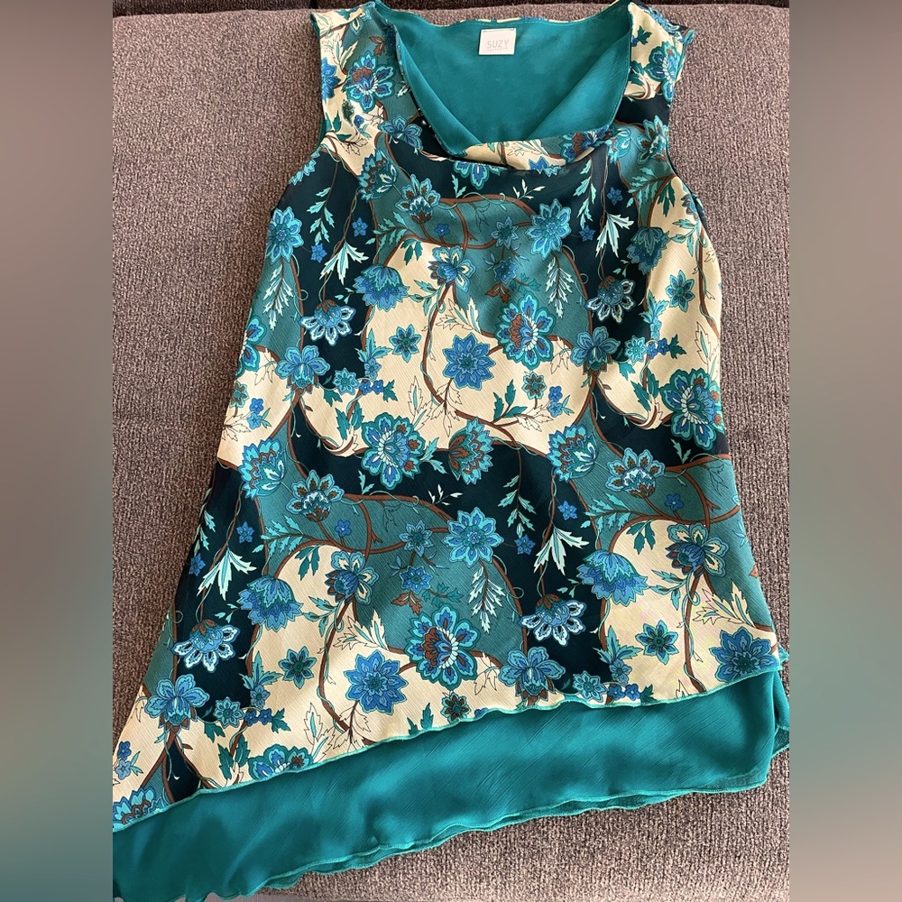 Woman’s sleeveless top, asymmetric.